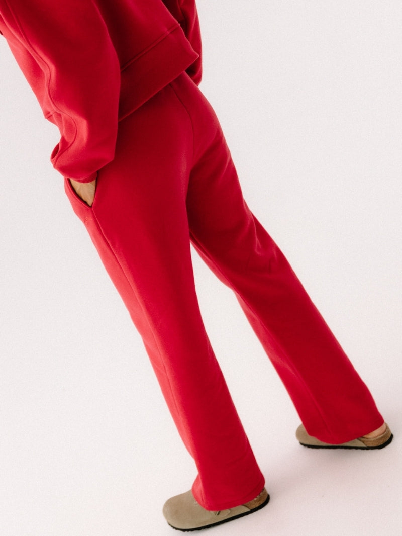 Czerwone bawełniane spodnie dresowe damskie Evolve - widok na nogawki