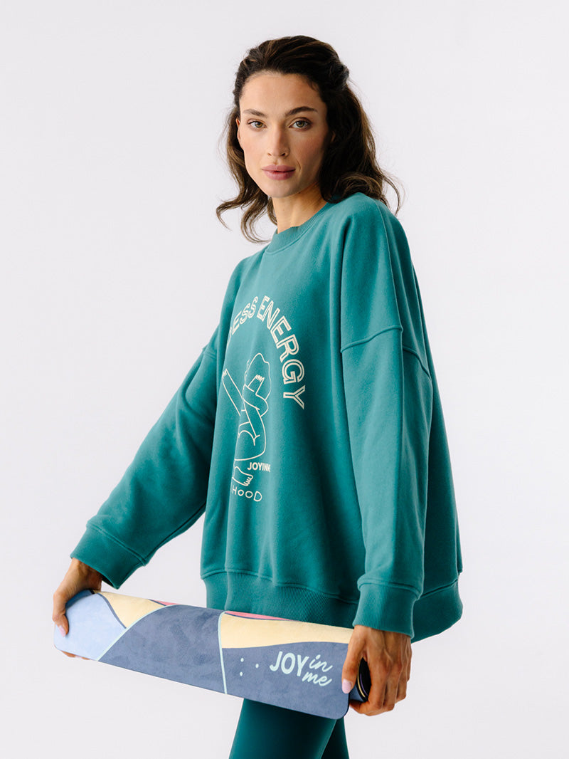 Kolorowa, składana mata do ćwiczeń jogi z kauczuku 1 mm z wzorem - zbliżenie na fakturę z mikrofibrą