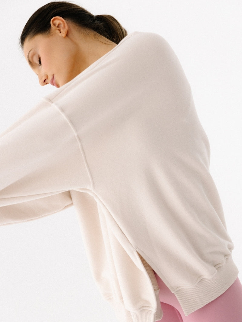 Damska, luźna bawełniana bluza oversize w kremowym kolorze z serii KIND