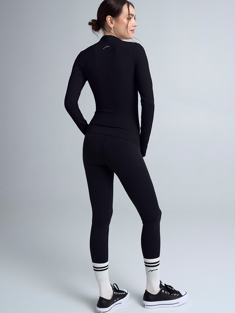 Sportowy czarny longsleeve damski z zamkiem Motion - widok na koszulkę z tyłu